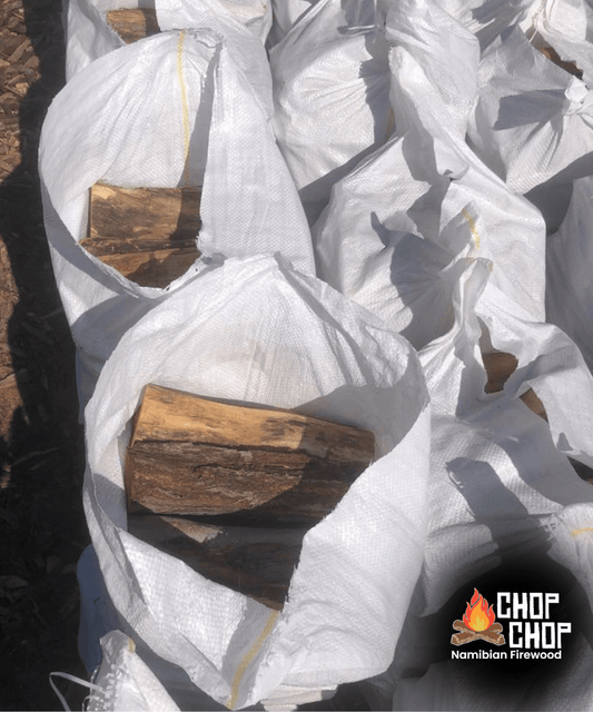 Firewood - Kameeldoring - 18kg bags filled with high-quality firewood, ideal for burning.