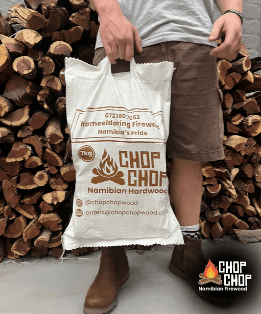 Firewood bag featuring Kameeldoring, 7kg of premium Namibian hardwood for exceptional burning properties.
